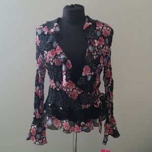 Sunny Leigh wrap around blouse.